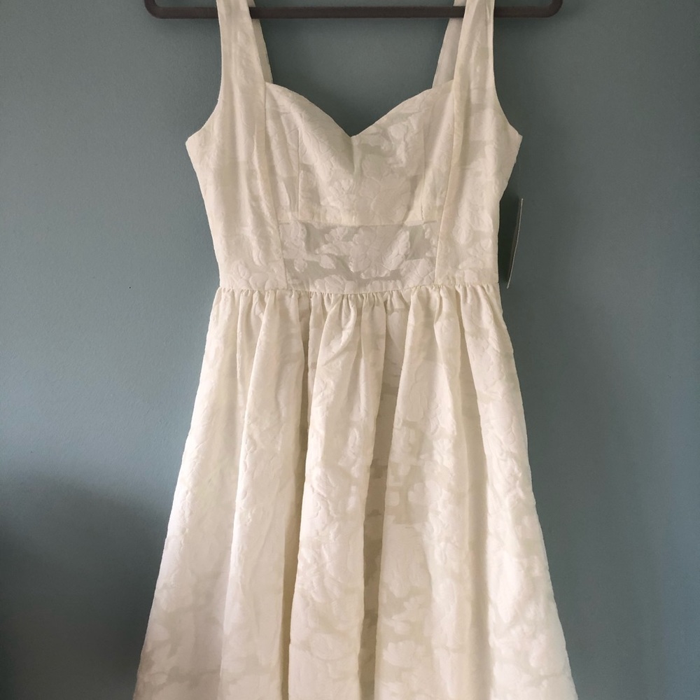 White, floral dress. Tag on. Summer dress.